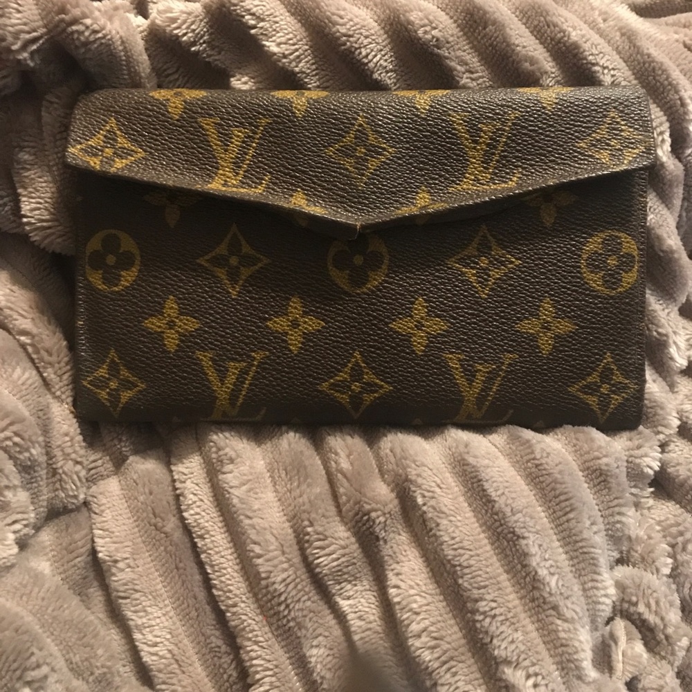 Vintage Authentic Louis Vuitton Saks Fifth wallet!